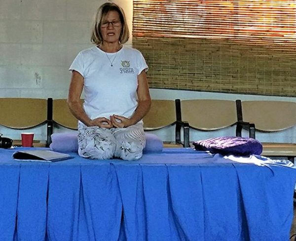 Lyn teaching yoga